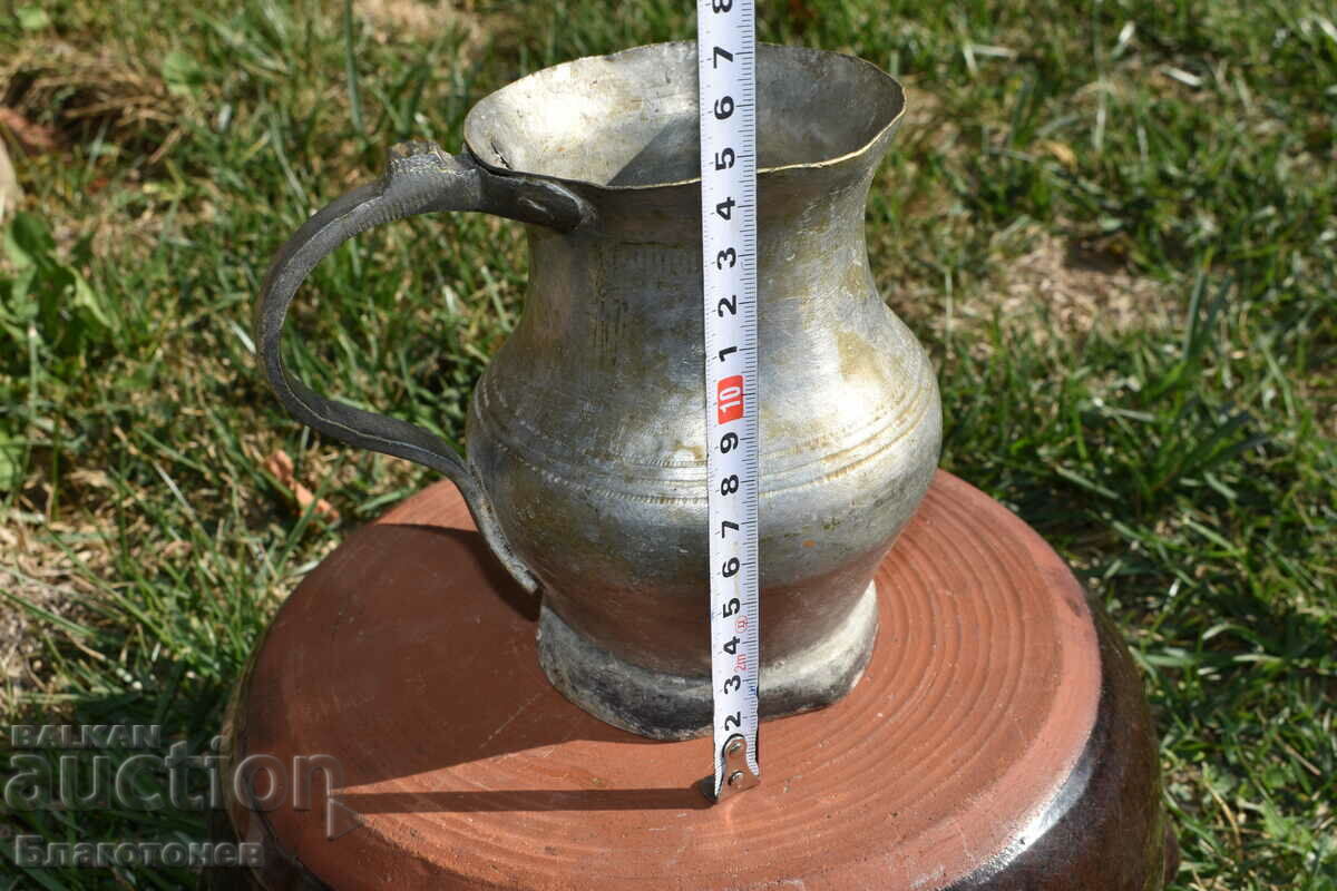 Delivery of Old wrought copper jug Delivery of Old wrought copper jug