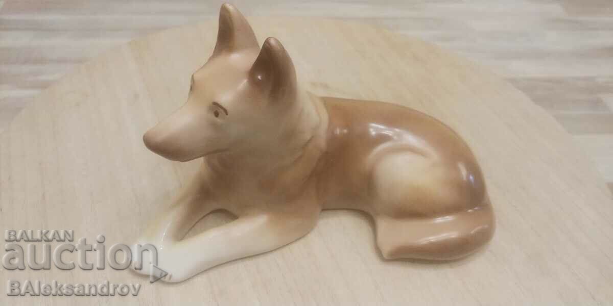 Large porcelain figure of a dog
