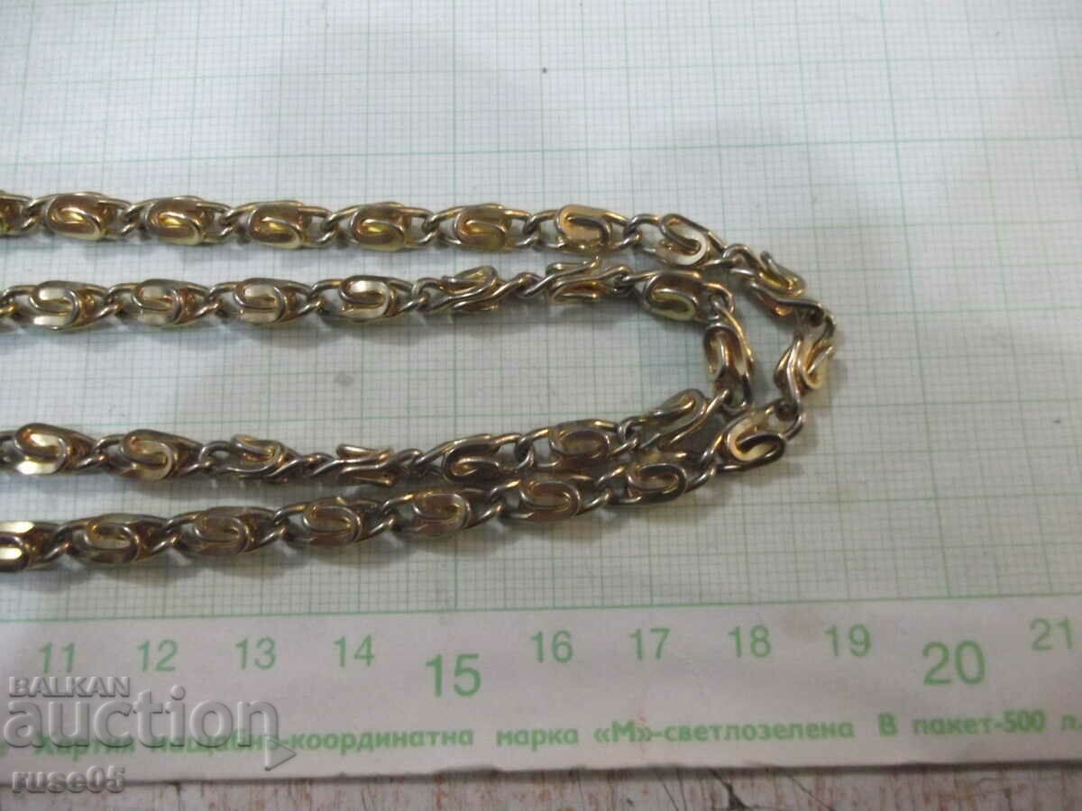 Auction  Imitation jewelry chain - 33 g.