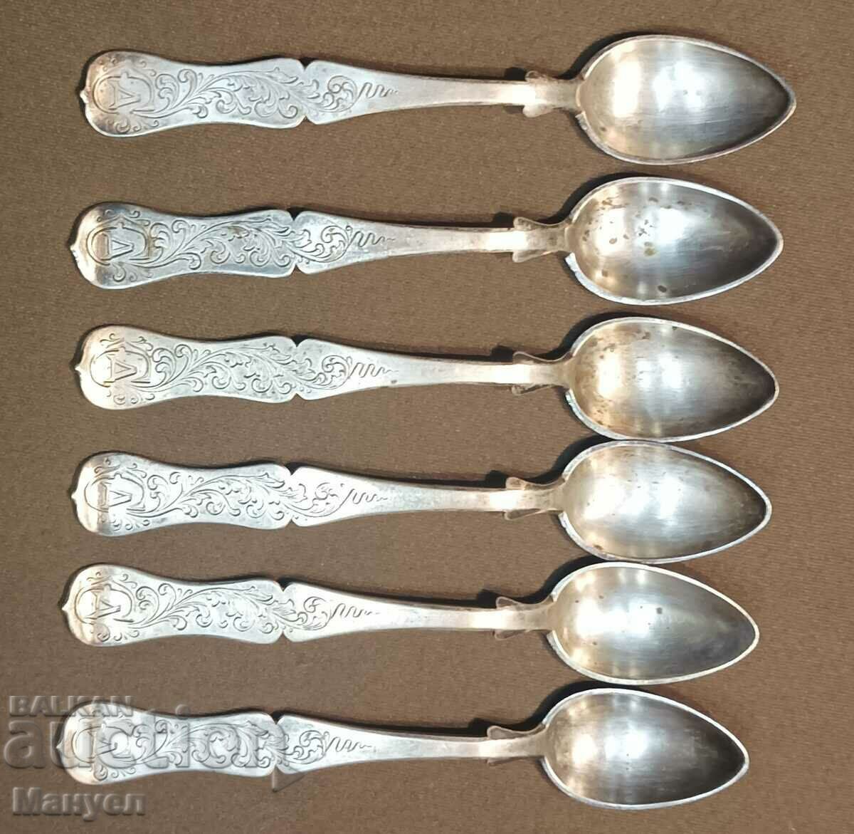 Auction  I am selling a set of old silver dessert utensils.