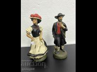 A pair of polyresin figures. #4809
