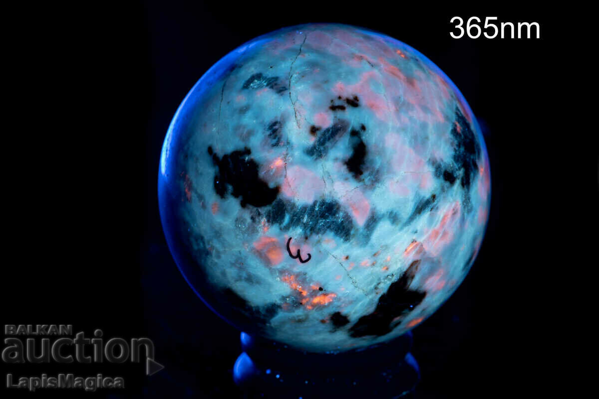 Fluorescent hackmanite sphere 291g 58mm