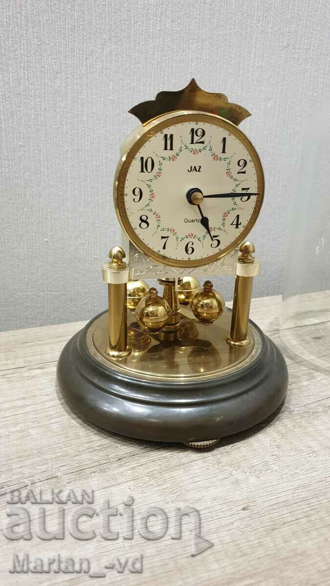 Auction  German table clock with glass dome
