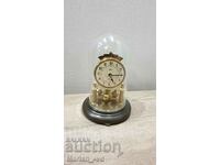 German table clock with glass dome