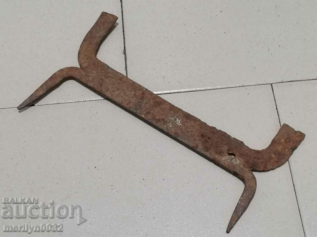 Old wrought iron scraper, wrought iron, primitive