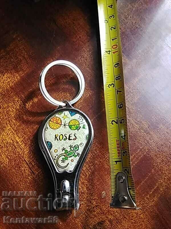 Keychain - nail clipper and opener.