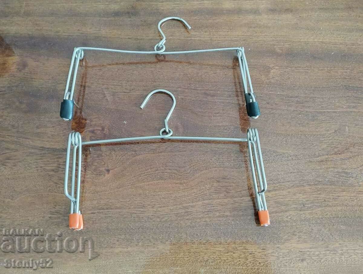 2 old metal hangers for pants, skirts