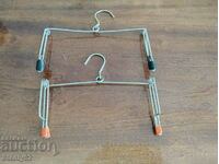 2 old metal hangers for pants, skirts