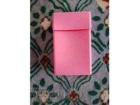 Slim silicone cigarette case.