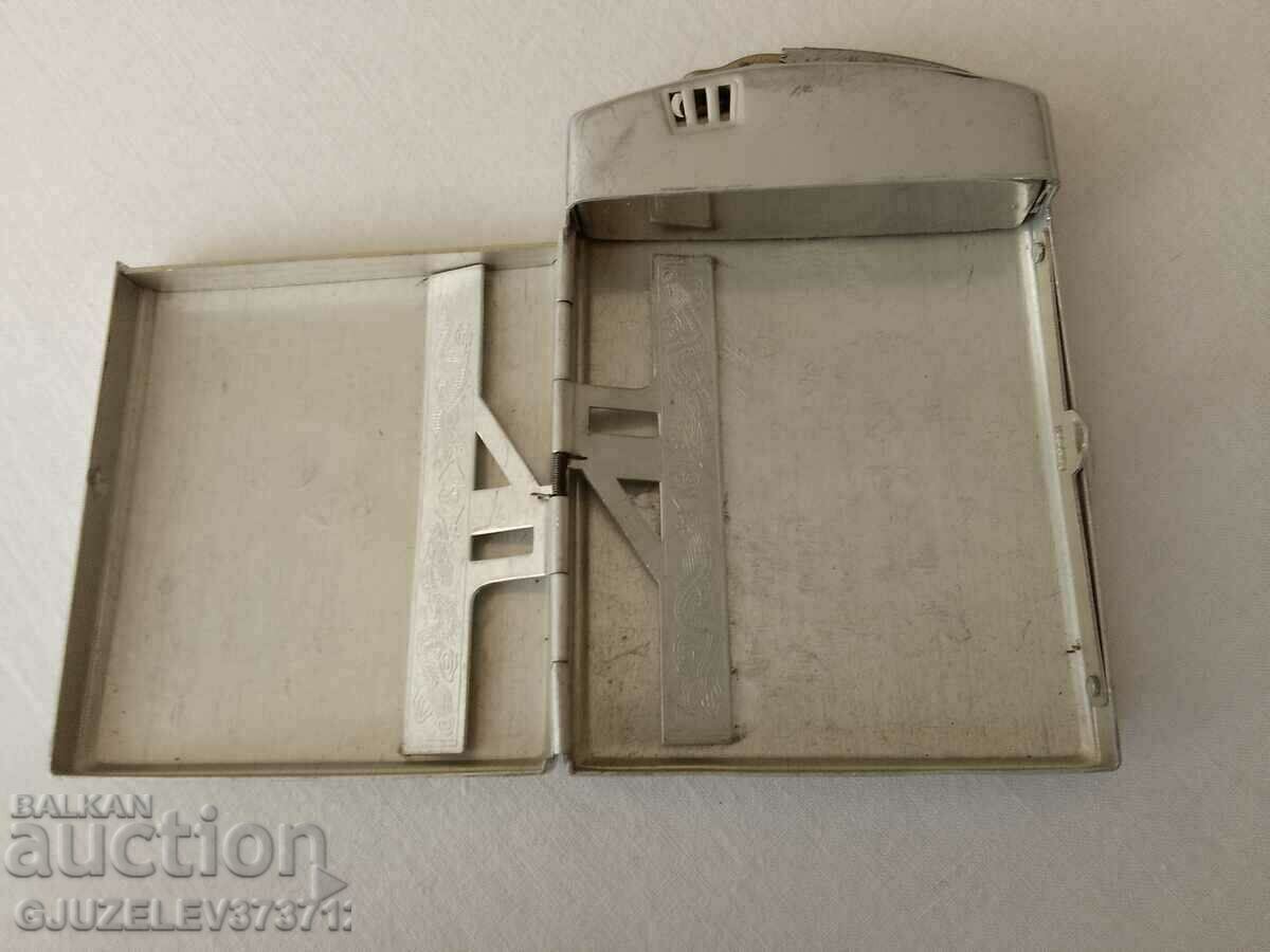 an old Chinese snuffbox with a built-in petrol lighter. Manual with price 29.00 BGN | € 14.83 an old Chinese snuffbox with a built-in petrol lighter. Manual with price 29.00 BGN | € 14.83