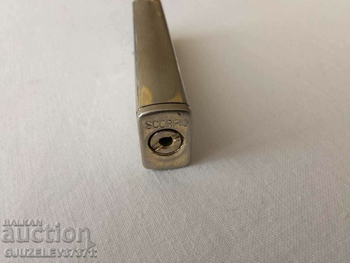Auction  Old skorpio lighter, changed blade, but due to new ones