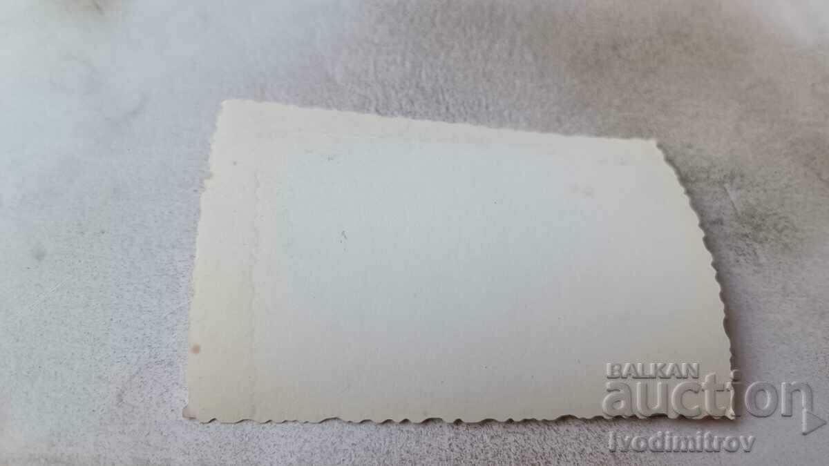 Photo A woman and two girls in front of a plane on a grass runway with price 2.35 BGN | € 1.20 Photo A woman and two girls in front of a plane on a grass runway with price 2.35 BGN | € 1.20