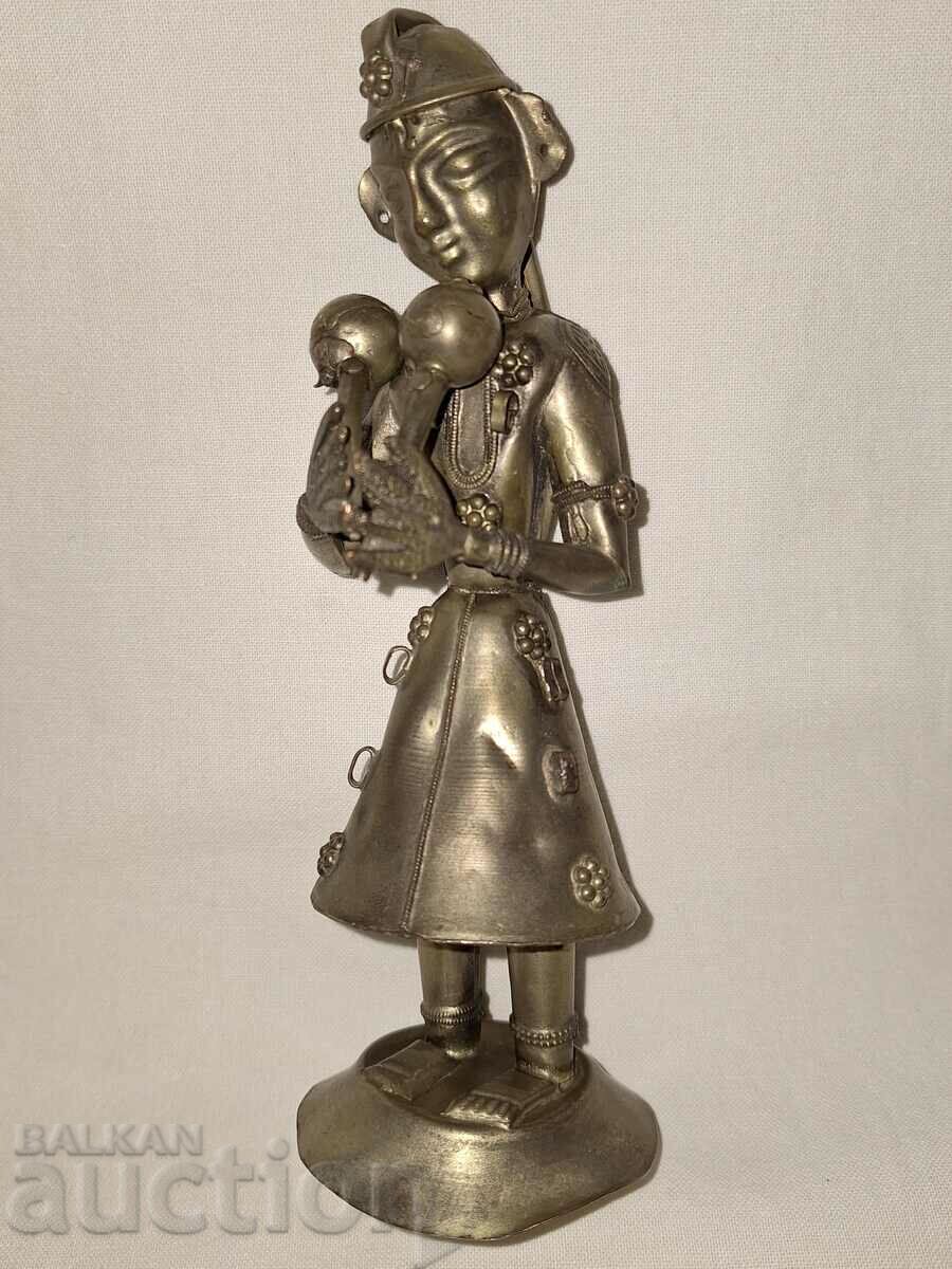 Antique copper hand-forged plastic figure