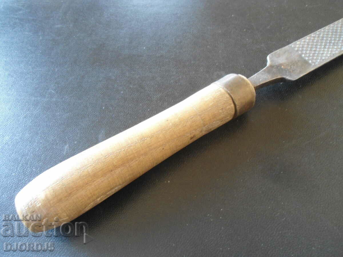 Old woodworking saw, half round