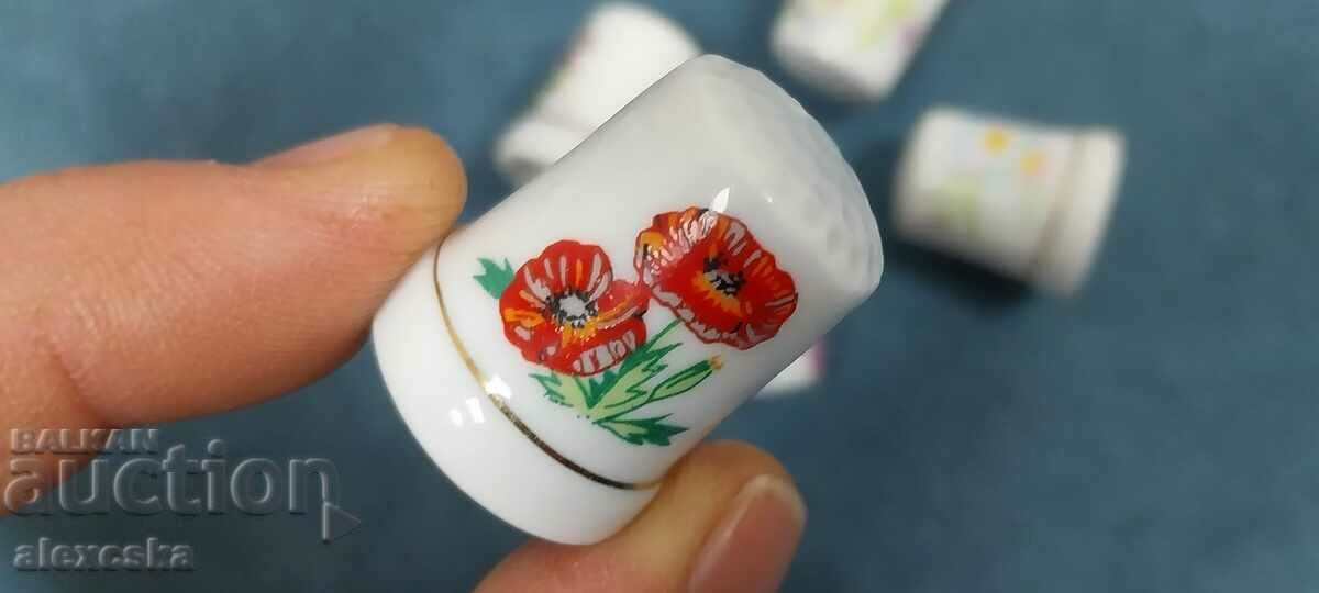 Auction  A collection of porcelain thimbles