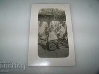 Old postcard child on a barrel 1928.