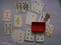 Remainder of a deck of cards and a box
