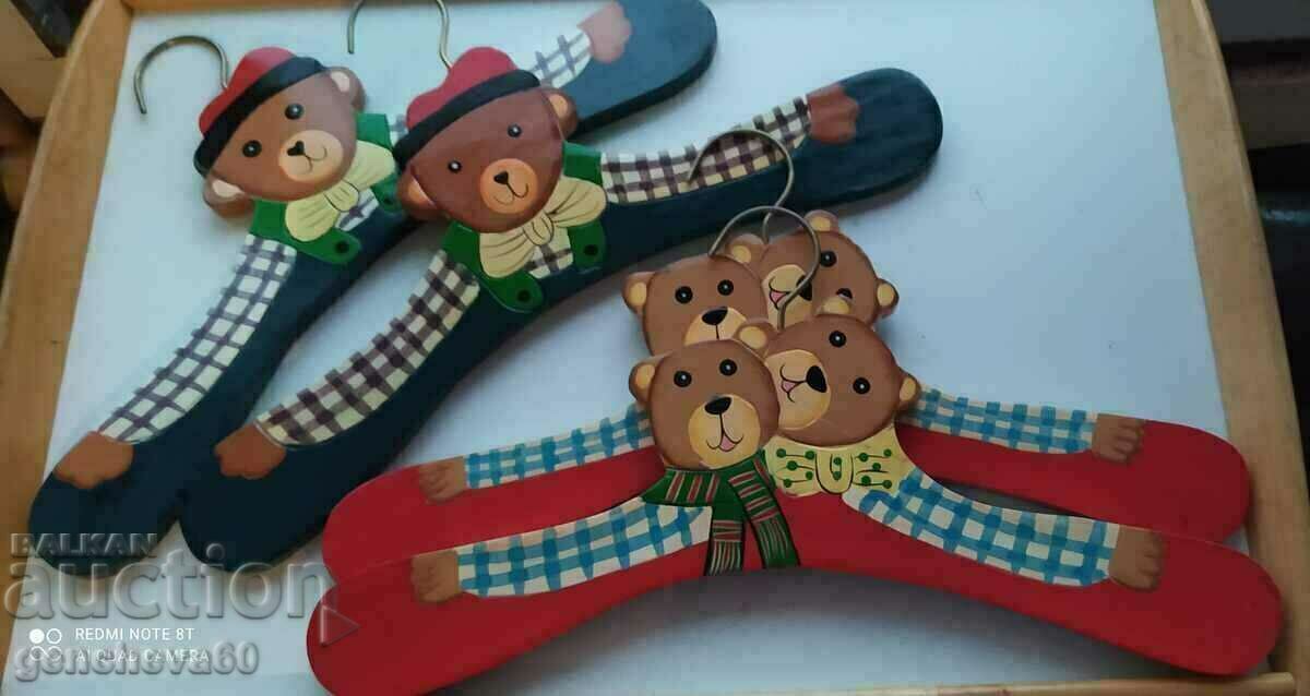 Hand painted four wooden hangers