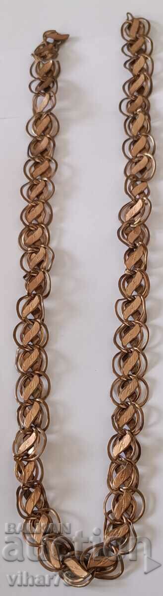 Old chain with gilding