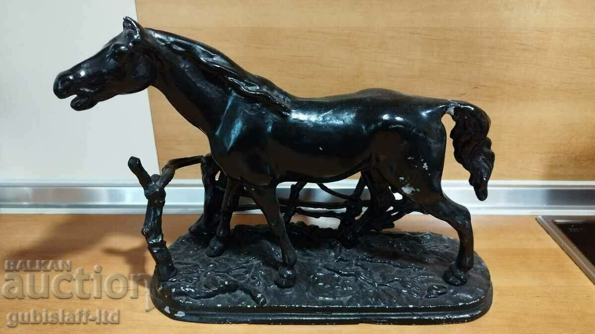 Old metal statuette, horse