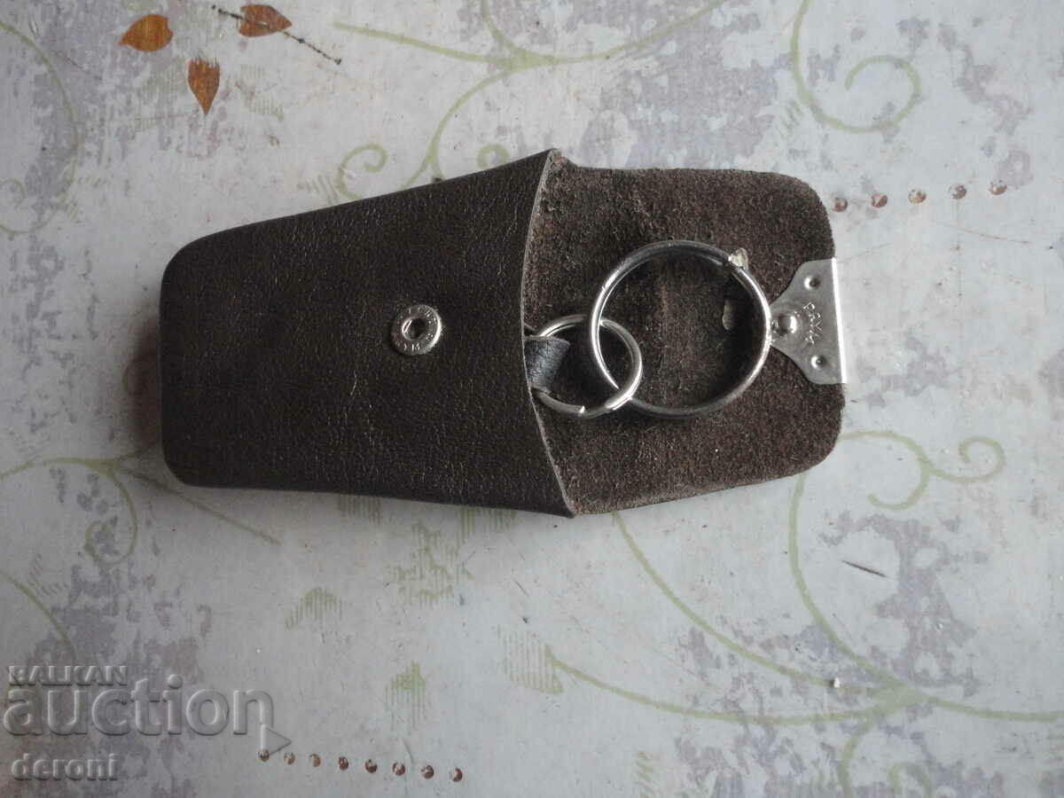 Auction A great keychain in a leather case Auction A great keychain in a leather case