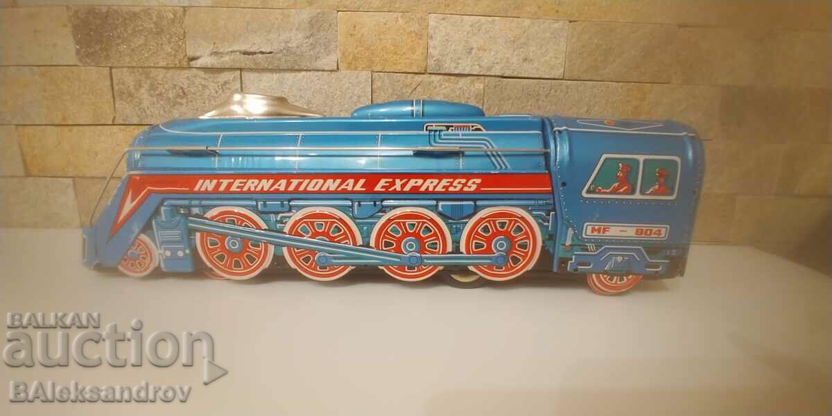Large tin toy locomotive