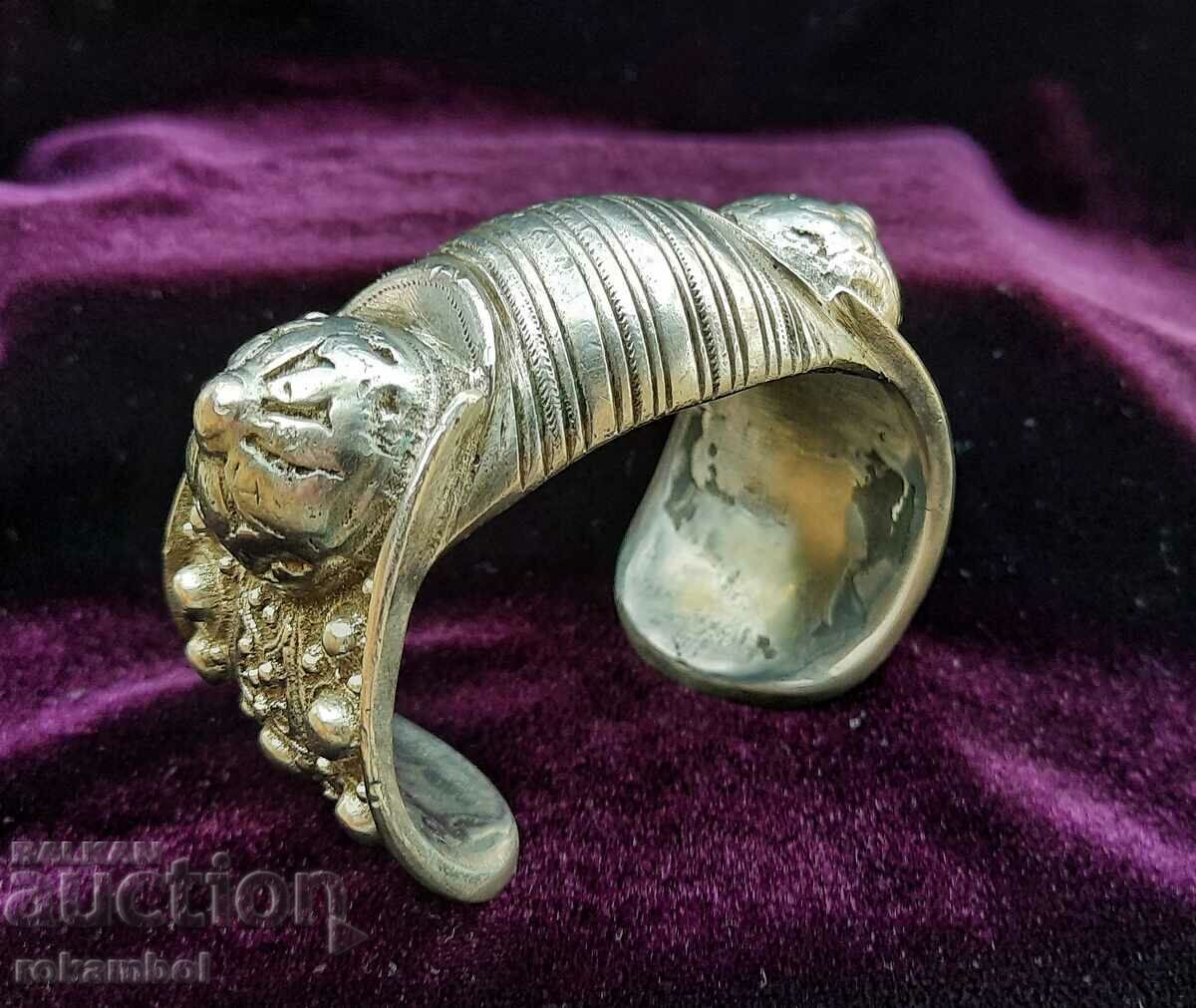 Renaissance silver slingshot bracelet.