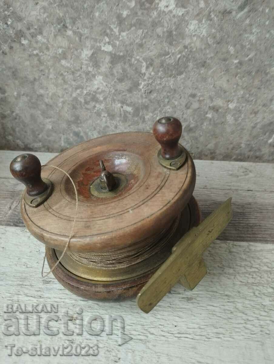 Old fishing reel - wood and bronze