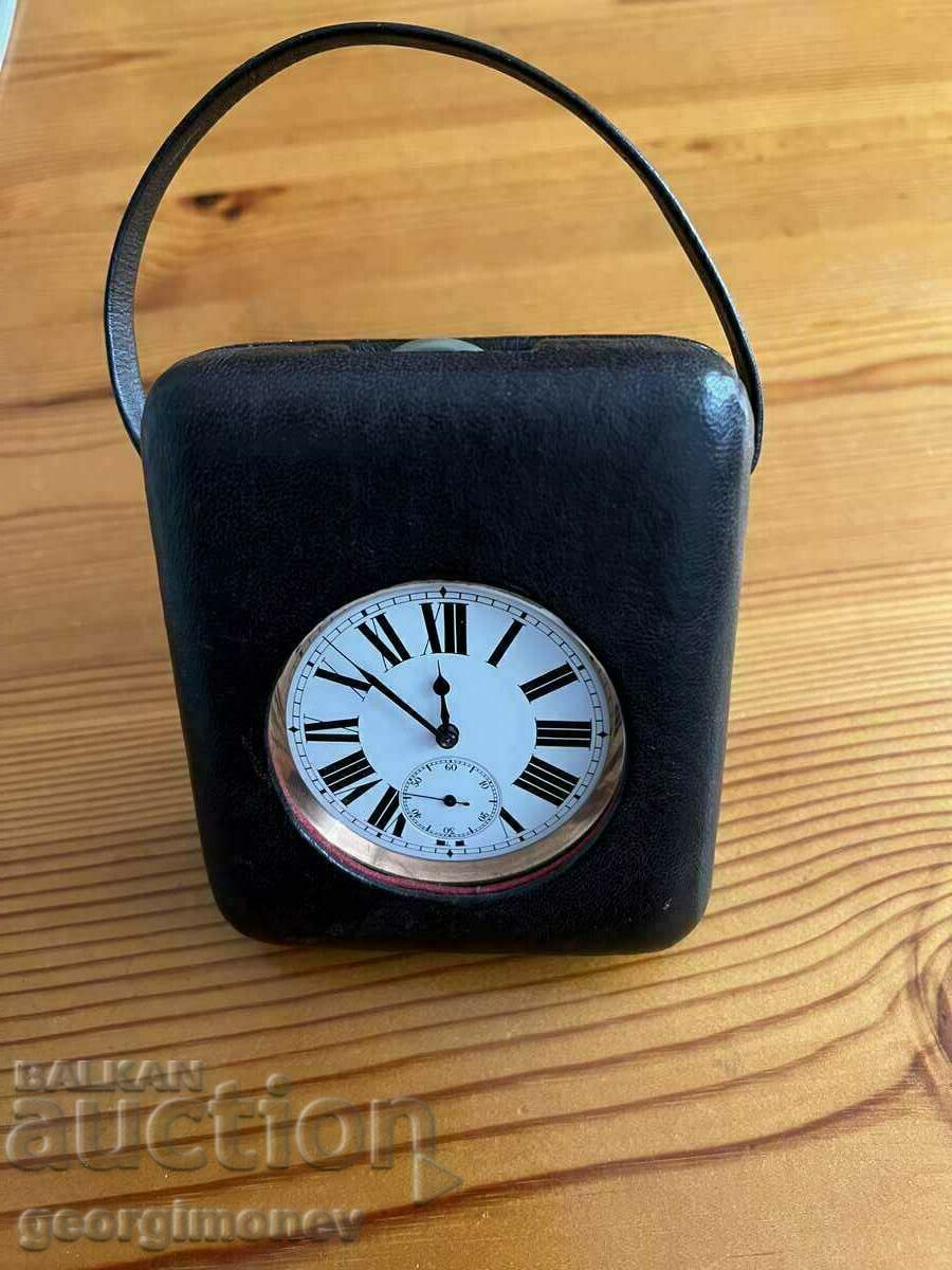 I am selling a rare Swiss table clock