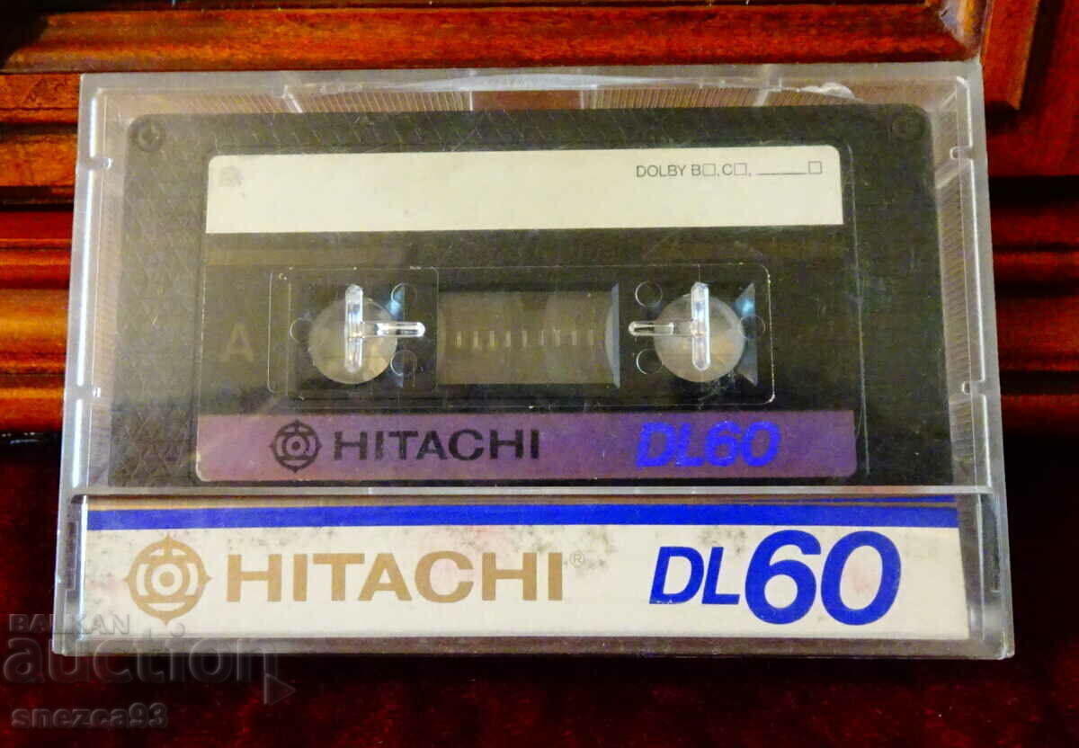 Hitachi DL60 audio cassette with guitar. Hitachi DL60 audio cassette with guitar.