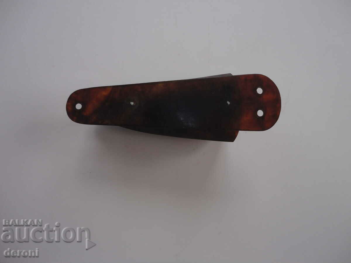 Delivery of Antique Catalin amber spoon Delivery of Antique Catalin amber spoon