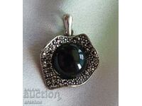 Silver locket with black tourmalines