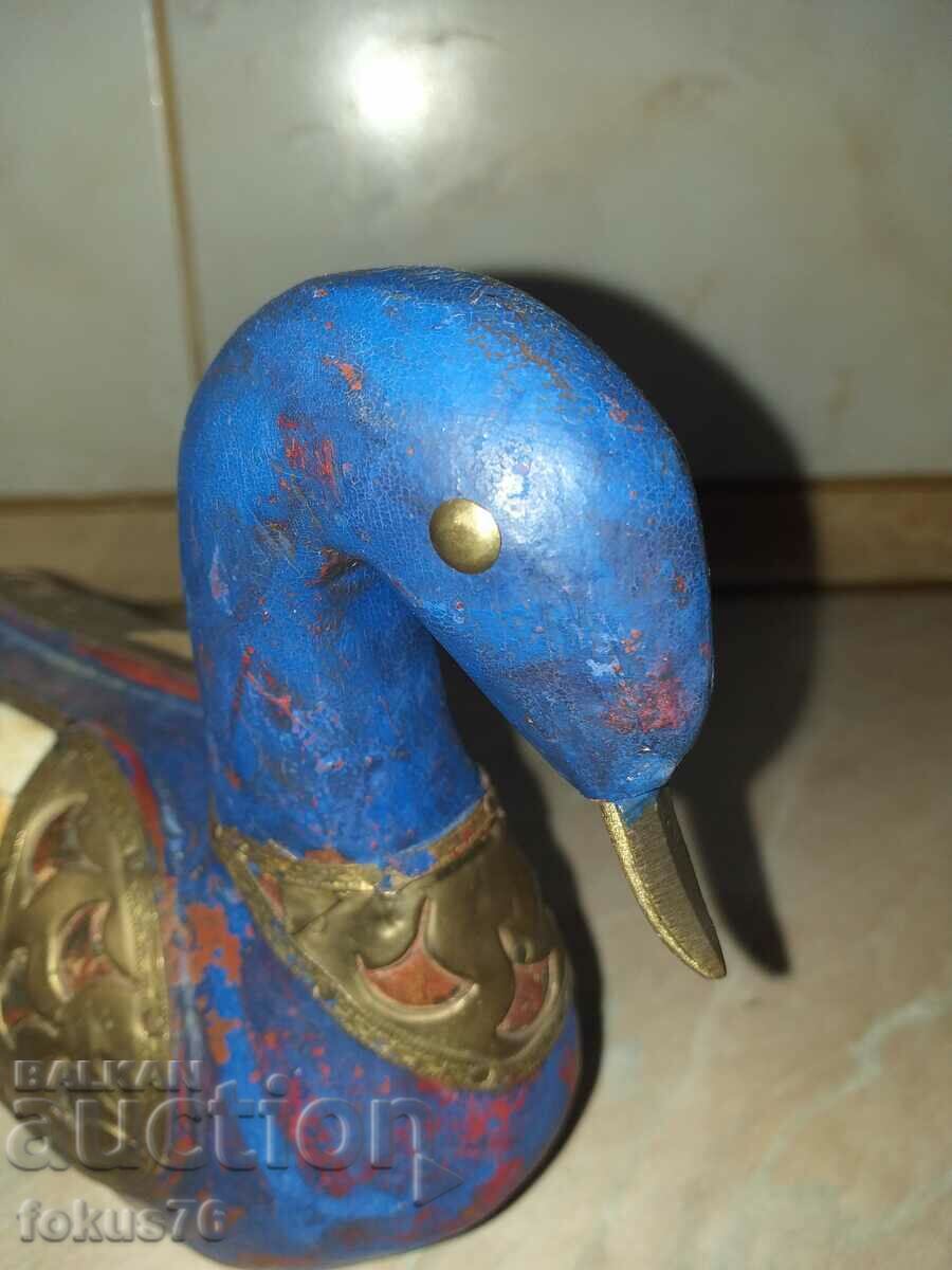 Auction A great blue wood duck with brass and bone Auction A great blue wood duck with brass and bone
