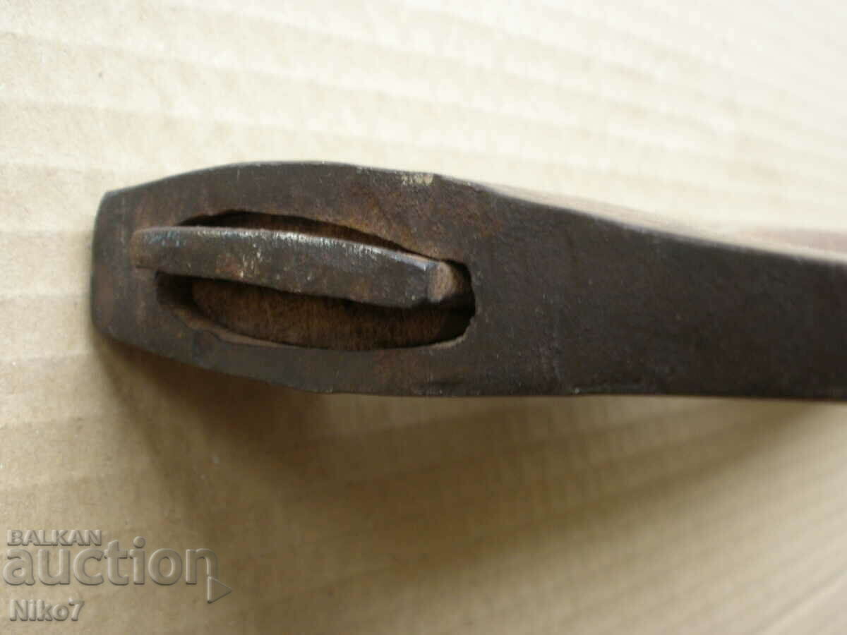Delivery of Old, branded hatchet, axe. Delivery of Old, branded hatchet, axe.
