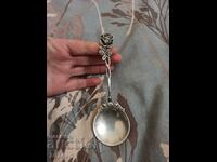 AN OLD SILVER SPOON WITH A BEAUTIFUL LARGE ROSE