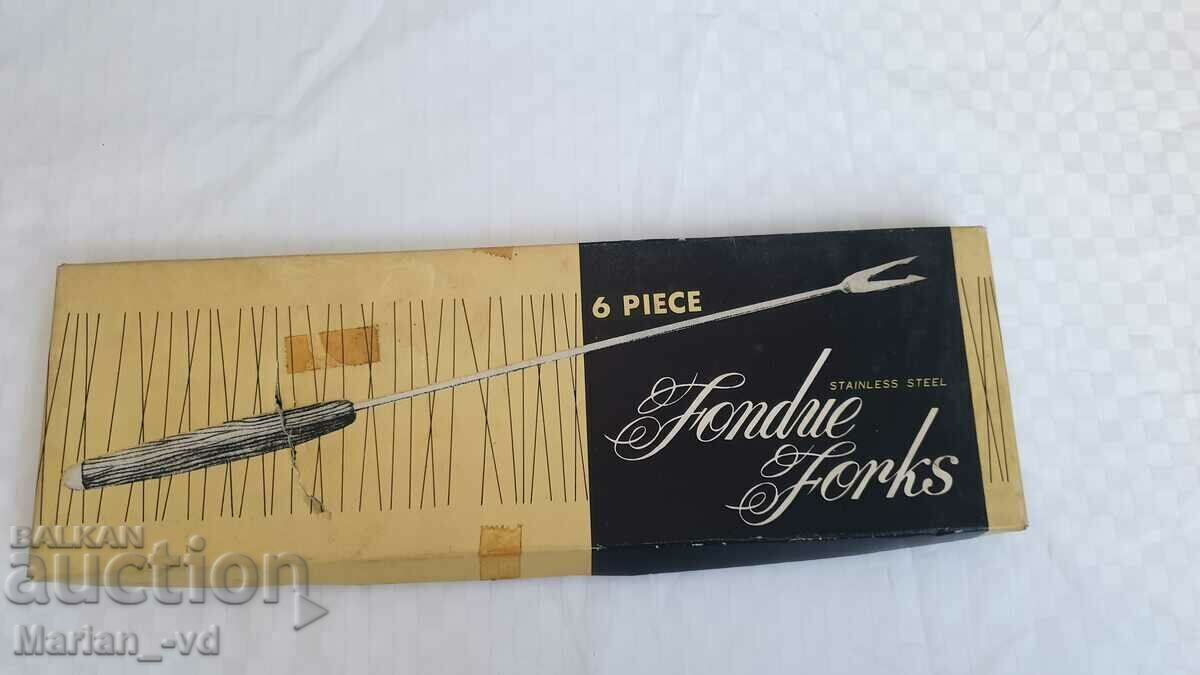 Set of fondue forks with wooden handles with price 40.00 BGN | € 20.45 Set of fondue forks with wooden handles with price 40.00 BGN | € 20.45