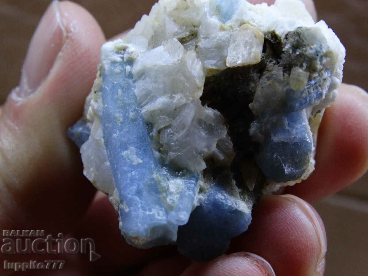 Auction natural beryl aquamarine on matrix 182.85 carats Auction natural beryl aquamarine on matrix 182.85 carats