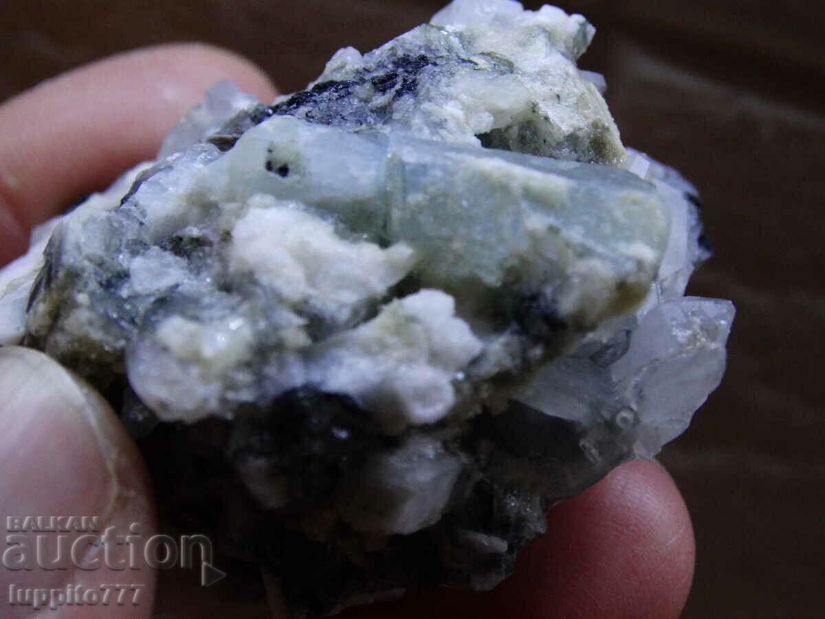 Auction natural beryl aquamarine on matrix 489.20 carats Auction natural beryl aquamarine on matrix 489.20 carats