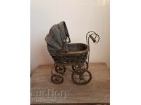 Vintage baby carriage for dolls