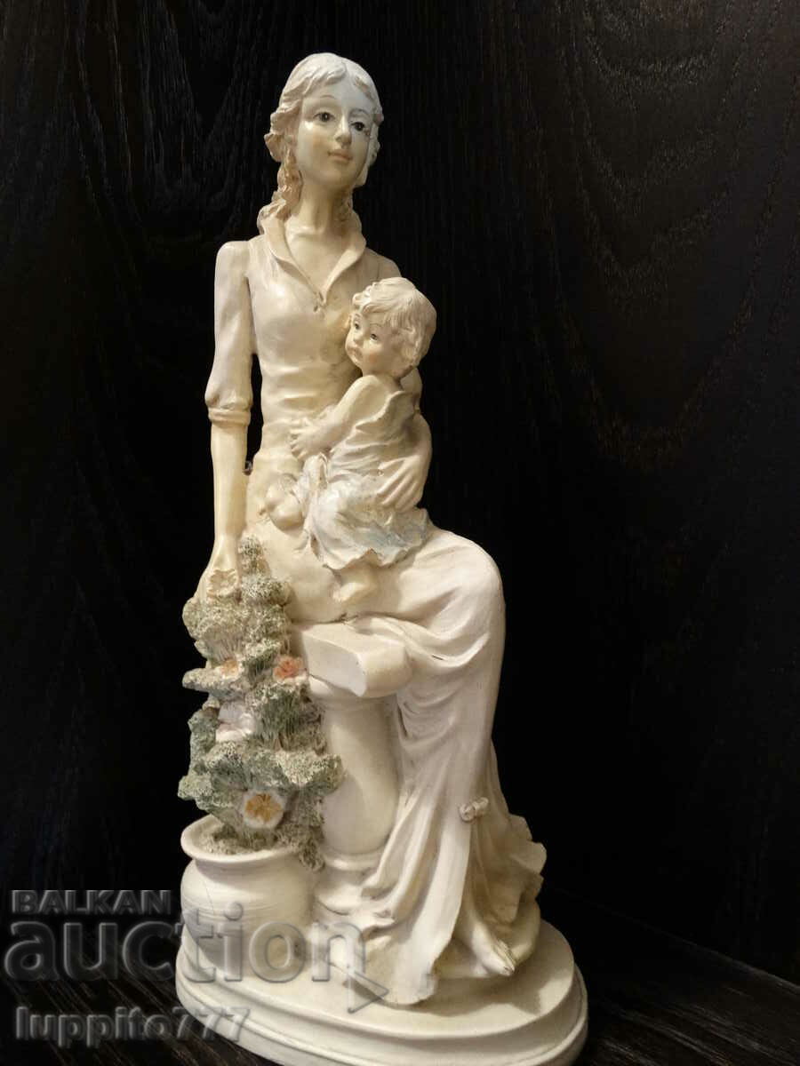 Sculpture statuette of a female figure with a child with price 255.00 BGN | € 130.38 Sculpture statuette of a female figure with a child with price 255.00 BGN | € 130.38