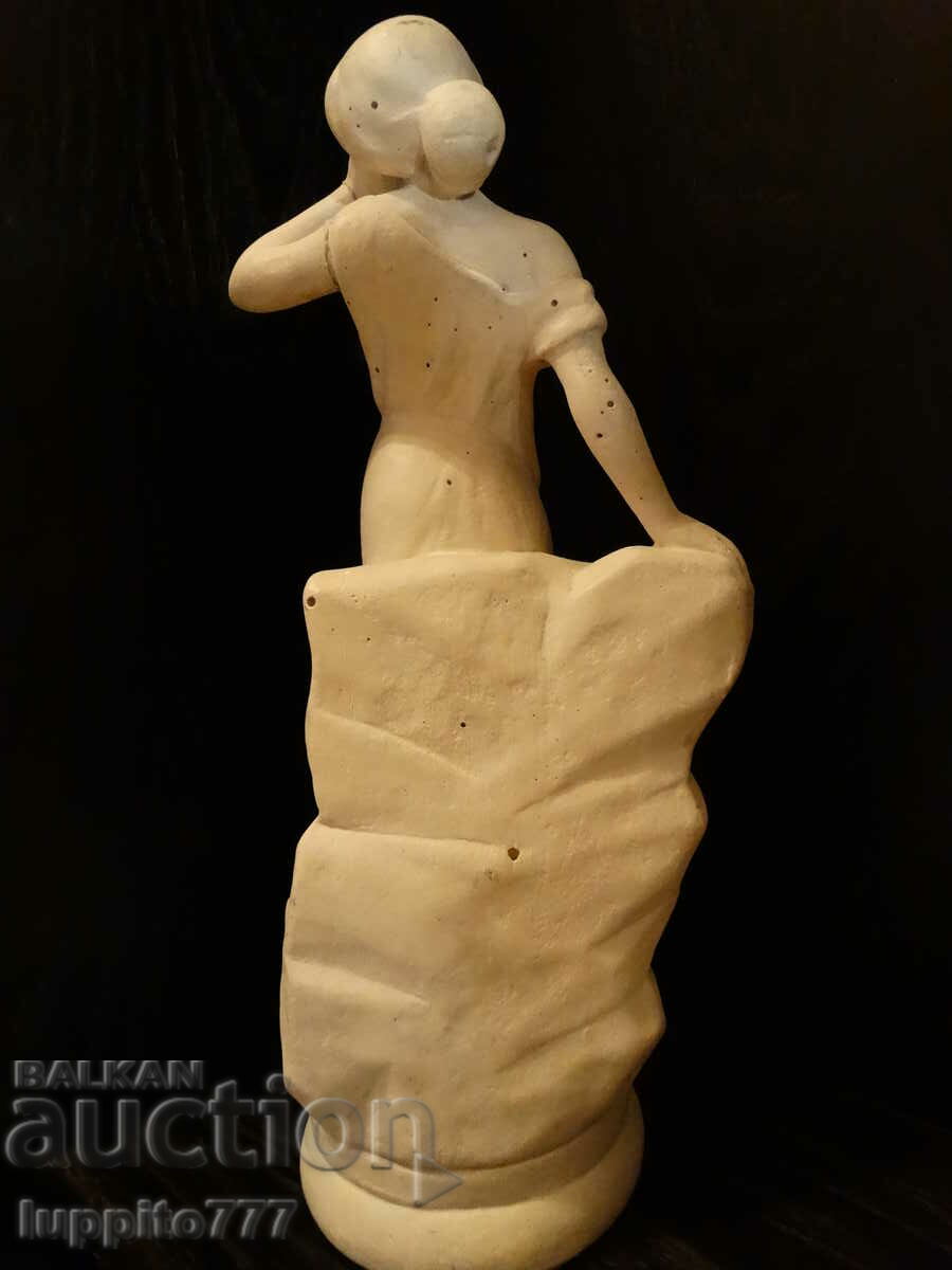 Delivery of Sculpture statuette stylized female figure