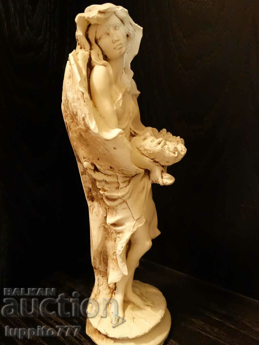 Delivery of Sculpture statuette stylized female figure Delivery of Sculpture statuette stylized female figure