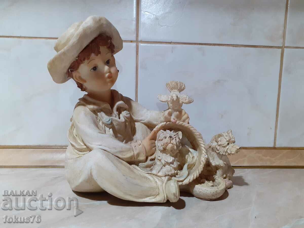 A great beautiful figurine of a boy with puppies and a dove with price 155.00 BGN | € 79.25 A great beautiful figurine of a boy with puppies and a dove with price 155.00 BGN | € 79.25
