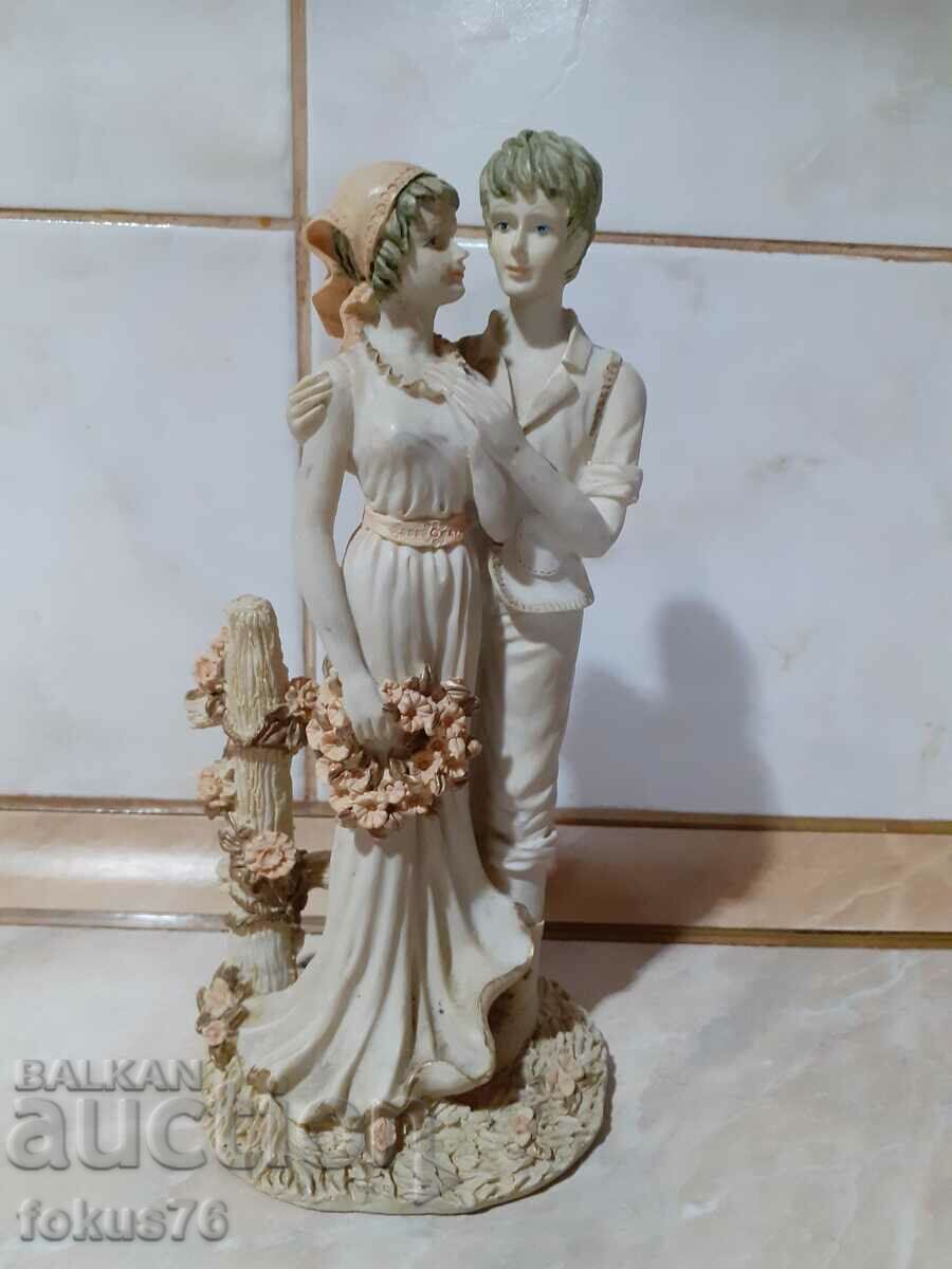 A great beautiful figurine of lovers