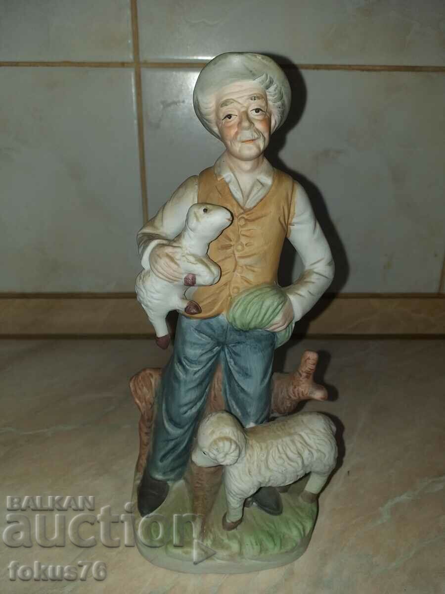 Great beautiful statuette figure grandfather with lambs