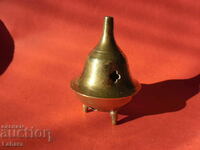 Small bronze candlestick with crosses