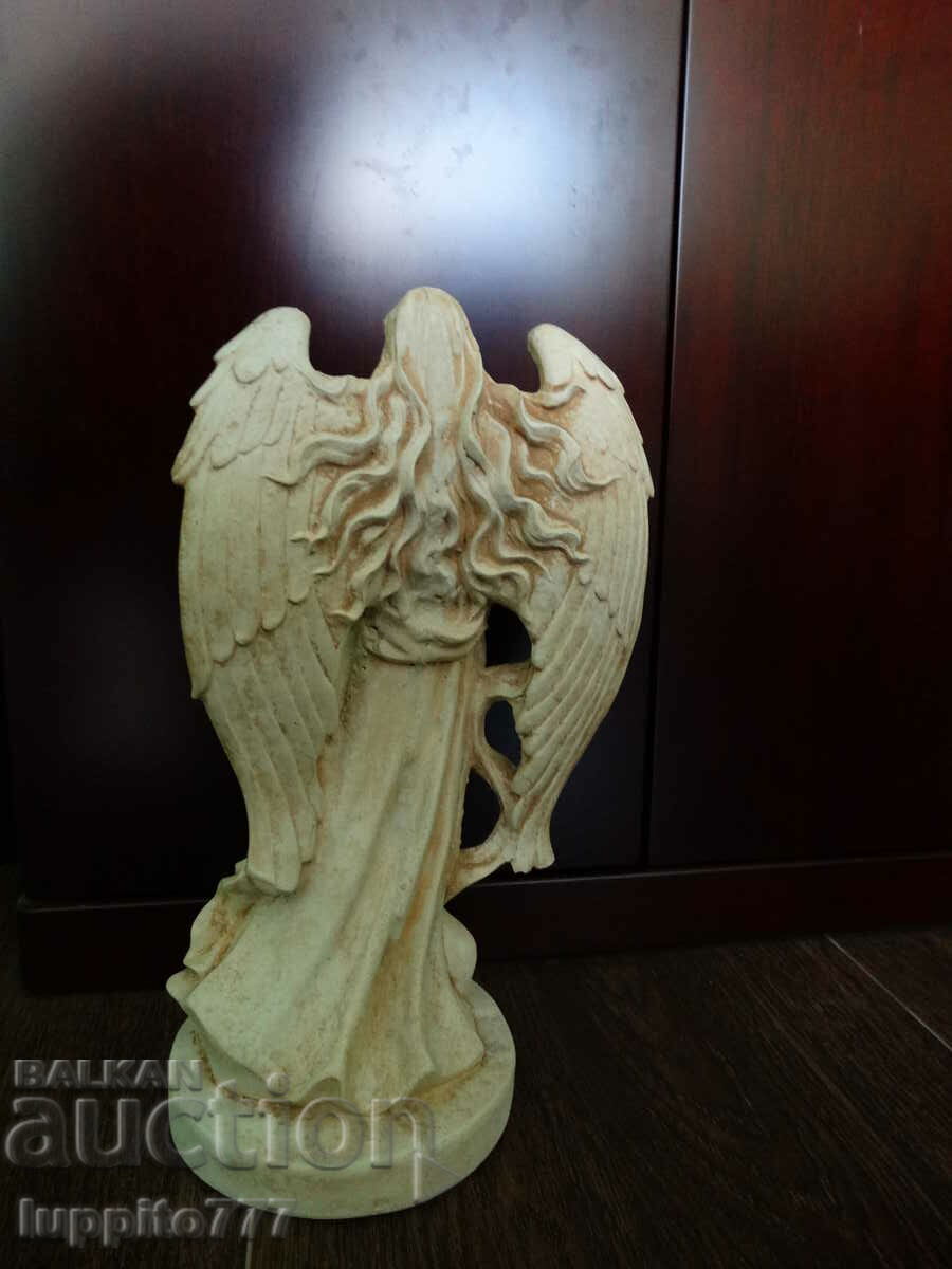 Delivery of Sculpture stylized figure angel handmade concrete Delivery of Sculpture stylized figure angel handmade concrete