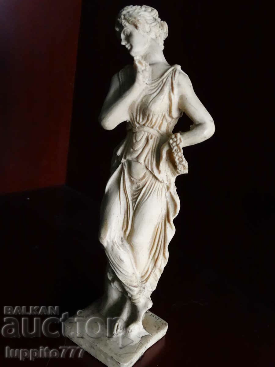 Auction Sculpture statuette antique stylized figure of a woman Auction Sculpture statuette antique stylized figure of a woman