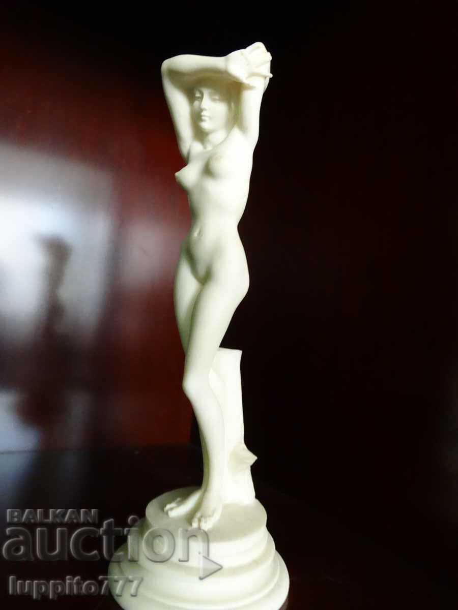 Auction Sculpture statuette antique stylized figure of a woman Auction Sculpture statuette antique stylized figure of a woman