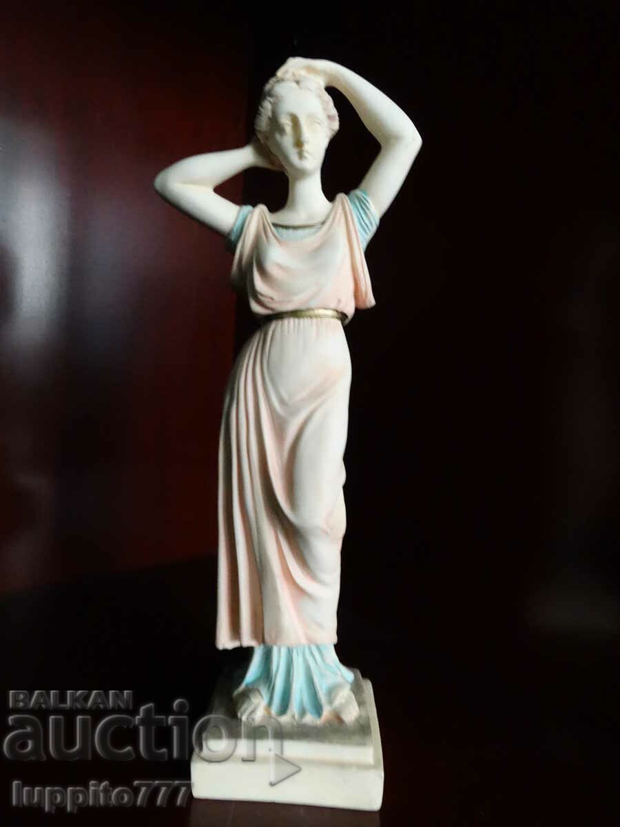 Auction Sculpture statuette antique stylized figure of a woman Auction Sculpture statuette antique stylized figure of a woman